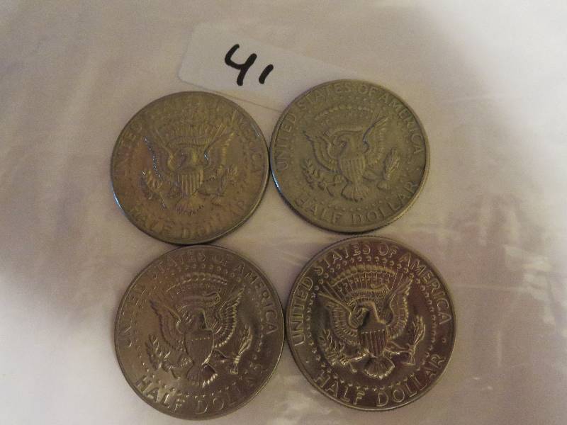 Lot of (4) Kennedy Half Dollars