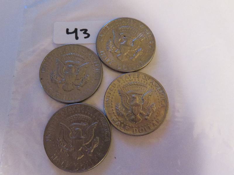 Lot of (4) Kennedy Half Dollars
