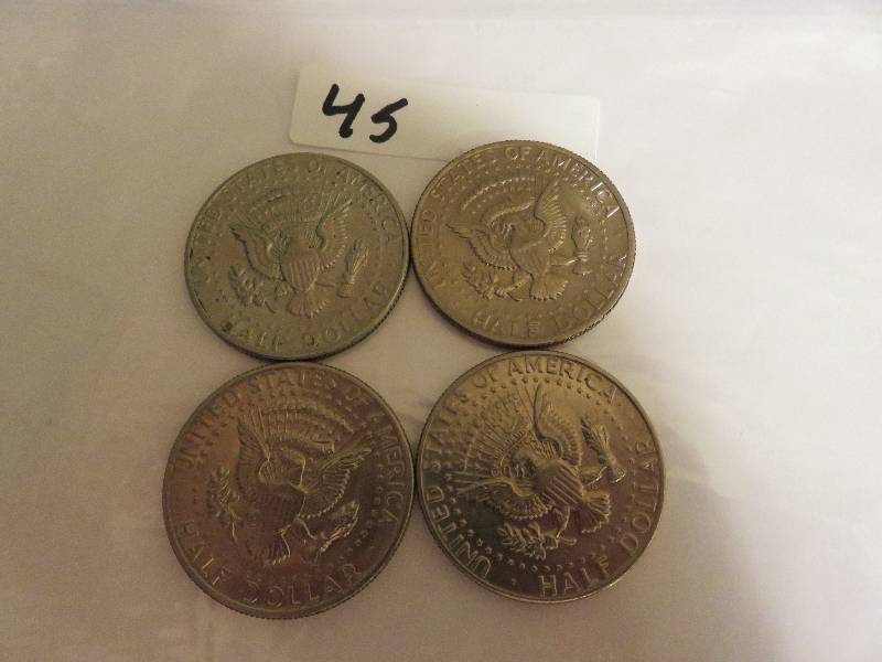 Lot of (4) Kennedy Half Dollars