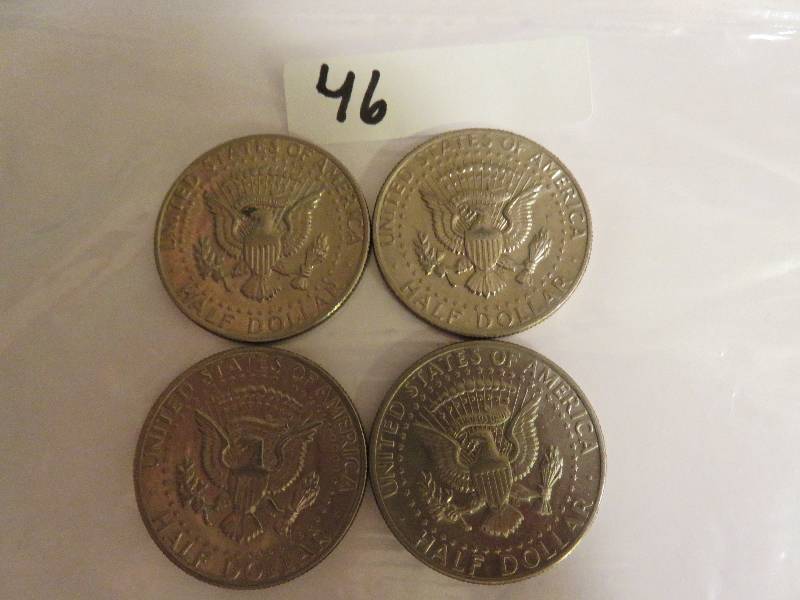 Lot of (4) Kennedy Half Dollars