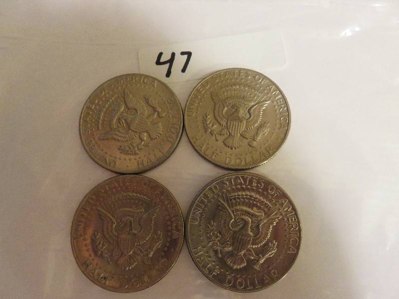 Lot of (4) Kennedy Half Dollars
