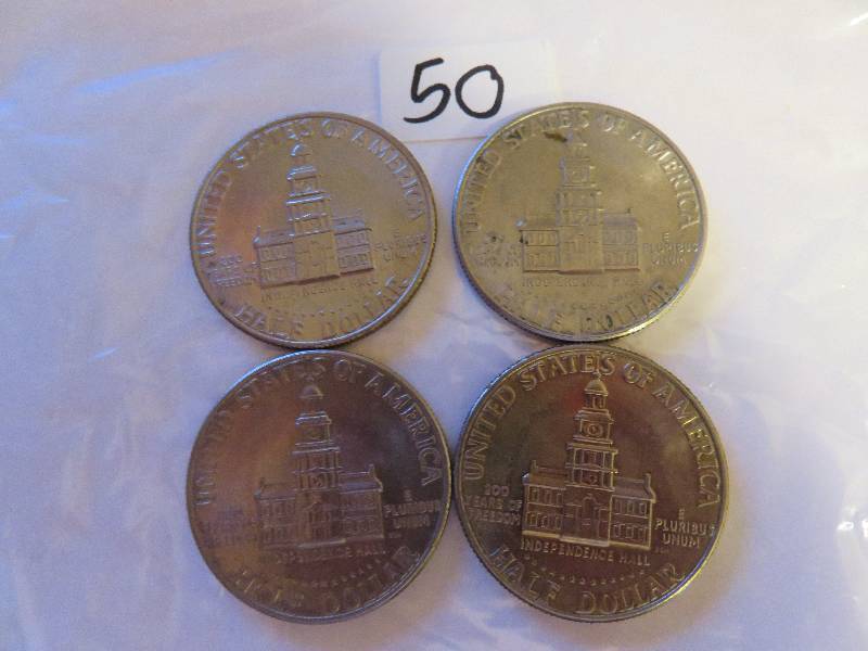 Lot of (4) Kennedy Half Dollars