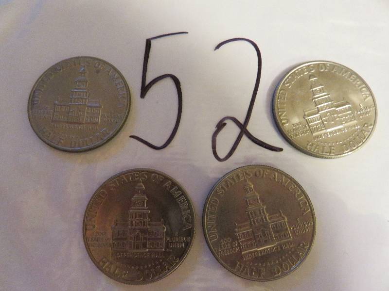Lot of (4) Kennedy Half Dollars