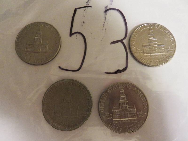 Lot of (4) Kennedy Half Dollars