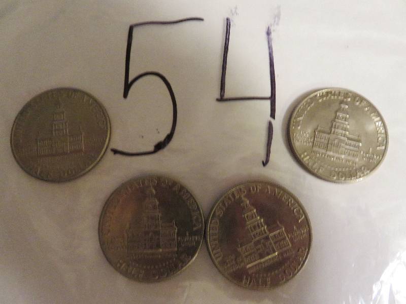 Lot of (4) Kennedy Half Dollars