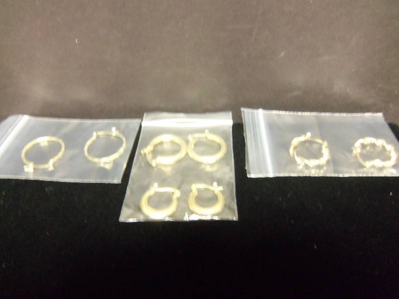 4 Pairs of Gold Earrings