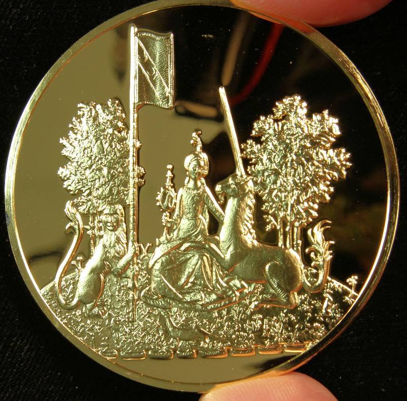 70.4 grams (2.26 TROY OZ.) .925 STERLING SILVER GOLD PLATED ART ROUND