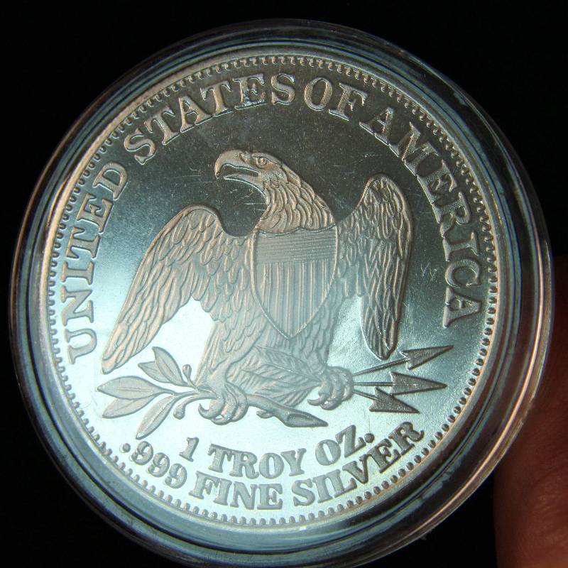 1 TROY OZ. .999 FINE SILVER SEATED LIBERTY DESIGN IN AIRTITE HOLDER