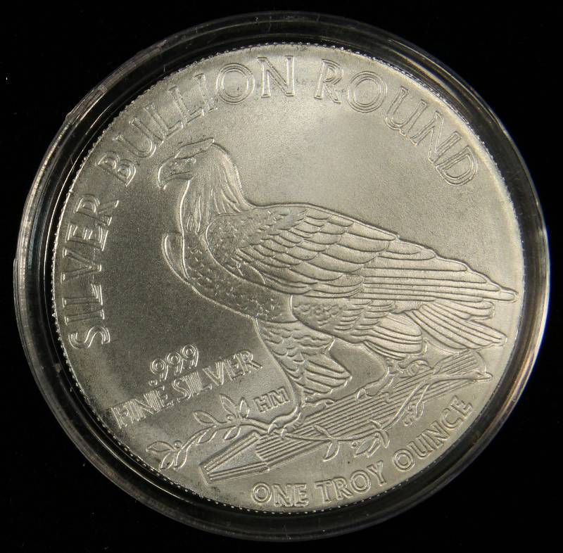 1 TROY OZ. .999 FINE SILVER INCUSE INDIAN DESIGN IN AIRTITE HOLDER
