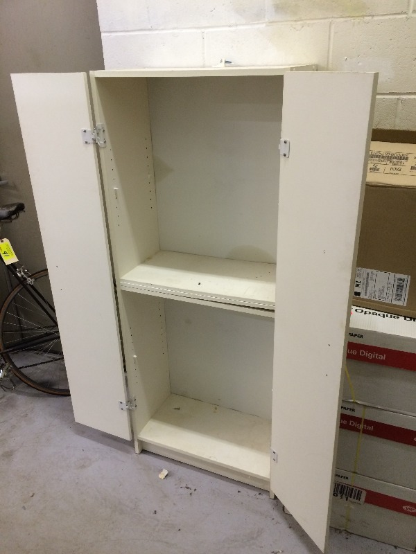 Storage Cabinet  Measures 24 wide x 13 deep x 60 tall  has 3 shelves