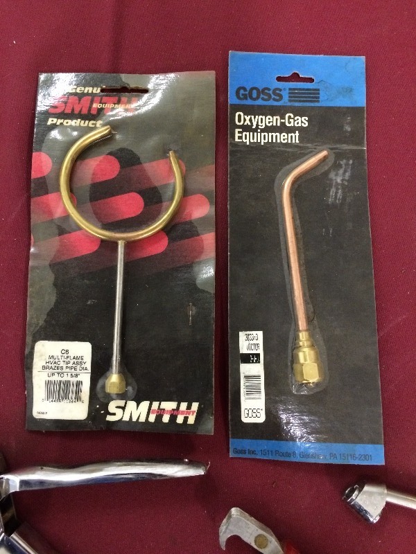 Torch Tips, wheeler-pilot tool, stapler, fin comb, tire gauge
