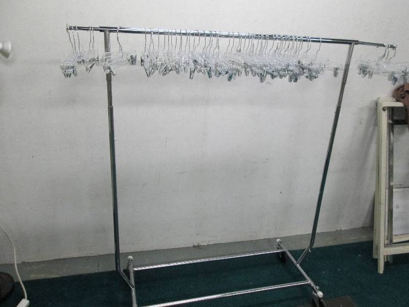 5 foot clothes rack with plastic pa...
