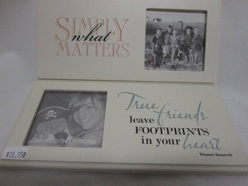 Lot of 2 off -white themed frames 3...