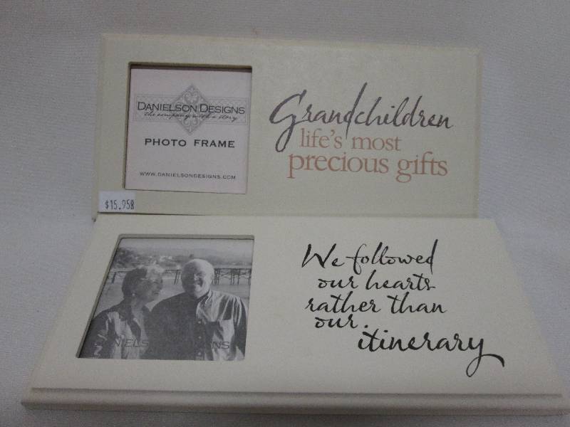 Lot of 2 off -white themed frames 3...