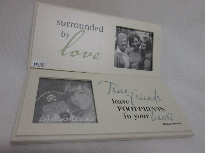 Lot of 2 off -white themed frames 3...