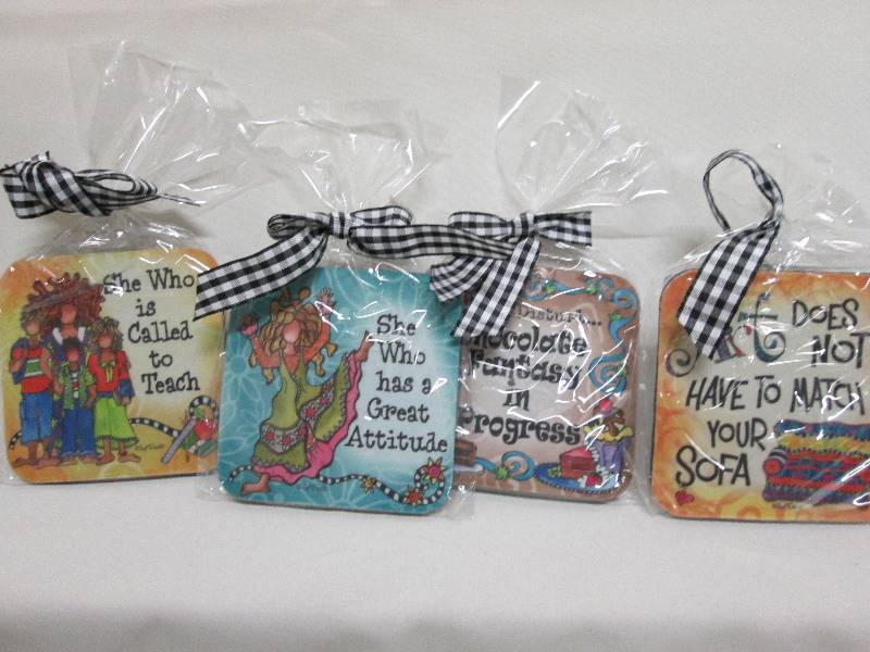 Lot of 4 assorted soft coasters...