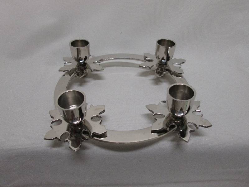 Silver metal 4 place candle ring...