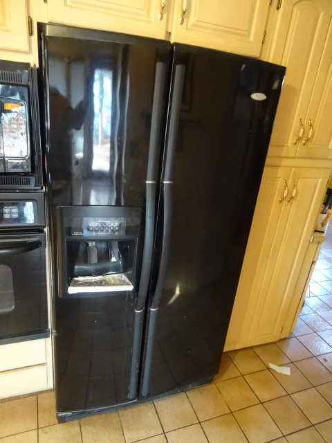 lot 1 image: Whirlpool Fridge Side by SideIcemaker