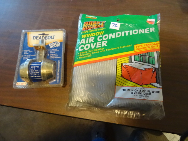 lot 72 image: Deadbolt set new and window air conditioner cover