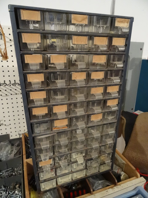60 Drawer hardware Cabinet with contents