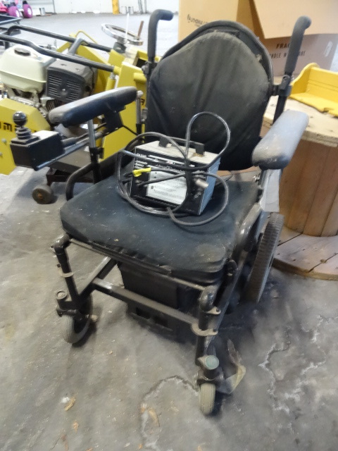 lot 71 image: Electric Wheel Chair with Charger