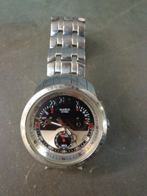 lot 11 image: Mens Swatch
