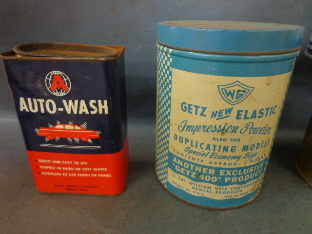 lot 46 image: Old Cans And A Jar