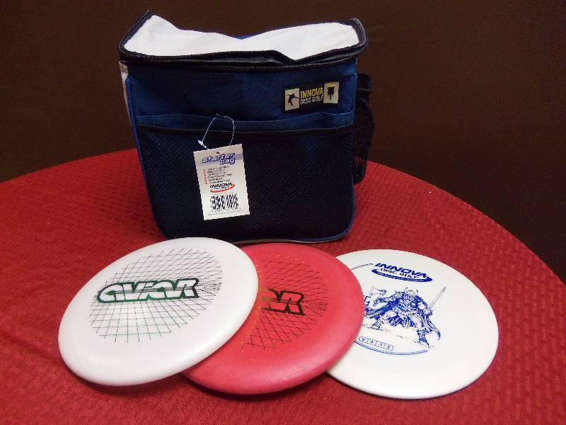 lot 65 image: Disc Golf Bag and Discs