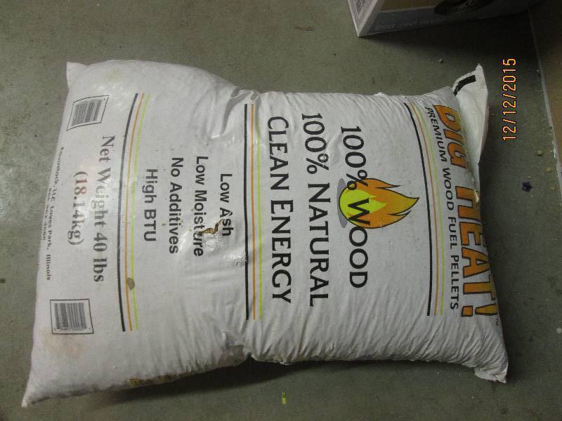 lot 14 image: 40 lb bag of wood pellet heating fu...