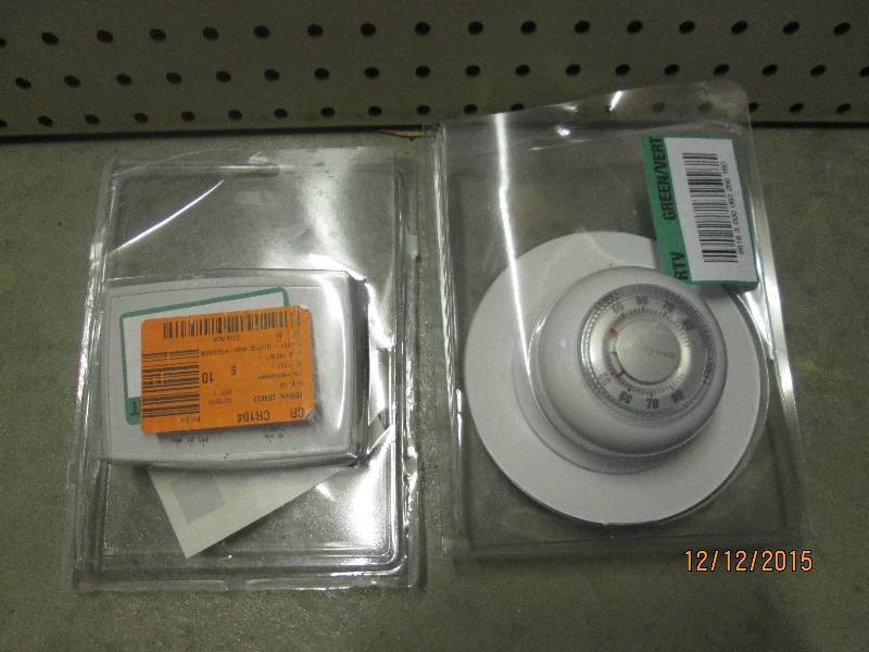 lot 24 image: Model # CT87K  Round Mechanical Thermostat Heat Only and Honeywell Digital Non-Programmable Thermostat