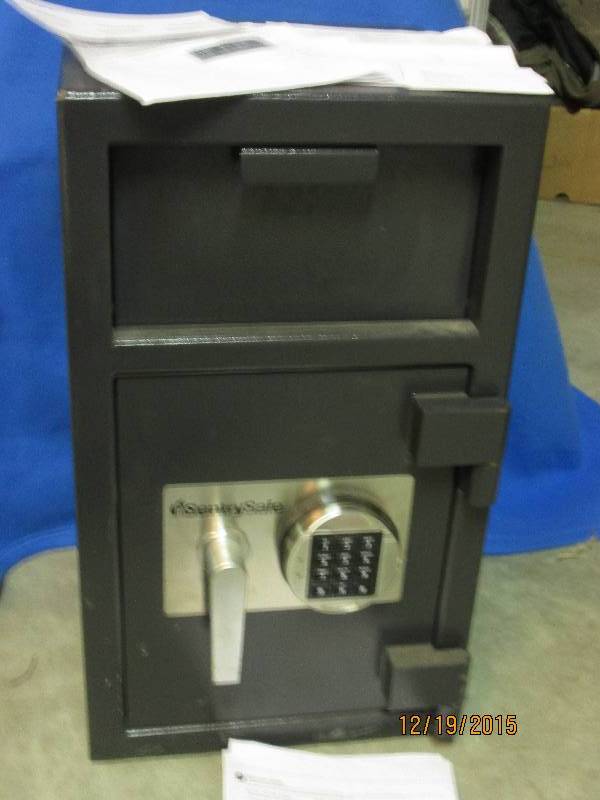 lot 42 image: Sentry drop safe, has battery opera...