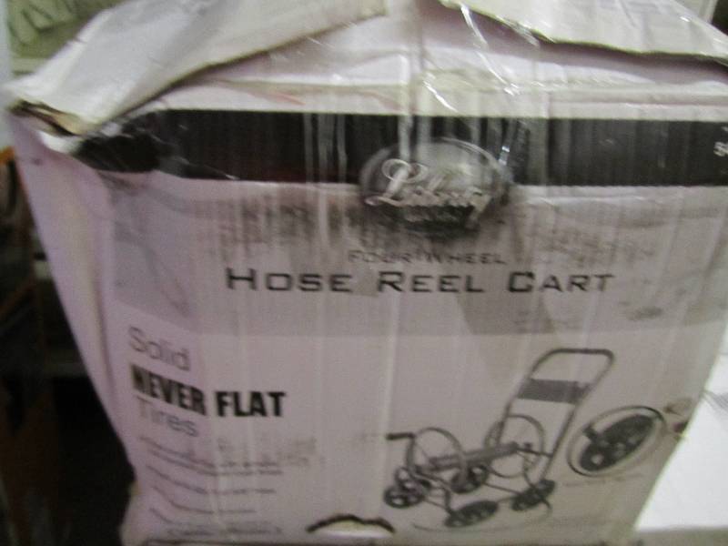 lot 83 image: 250 foot capacity metal hose reel c...
