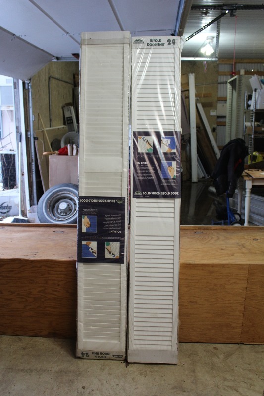 Pair of 24 Solid Wood Bi-Fold Doors
