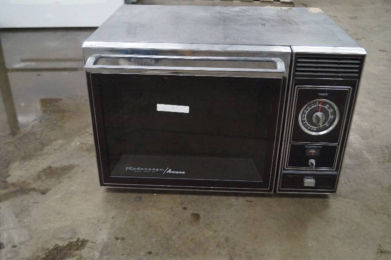 lot 24 image: Amana Microwave