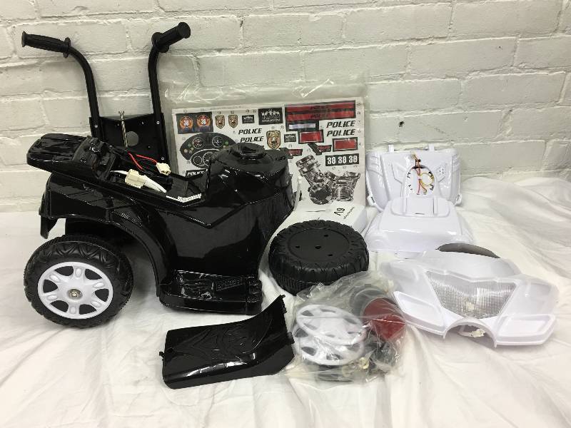lot 13 image: Kid Motorz Lil Patrol 6V Motorcycle Ride-On retail $79