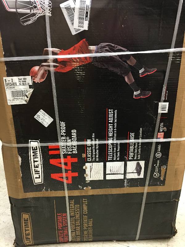 lot 76 image: Lifetime 44 Pro Court Portable Basketball System retail $129