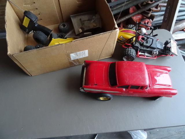 lot 61 image: Remote Controls Parts and 2 Cars