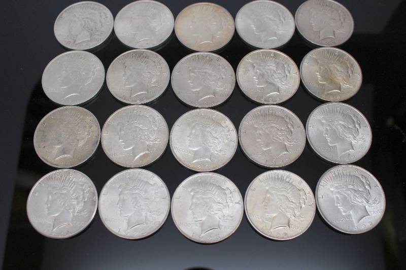 Roll of 20 Assorted AU Silver Peace Dollars