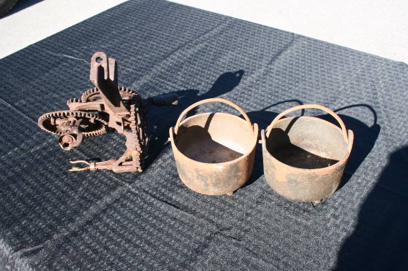 Antique Cast Iron Set of two bowls and Peeler