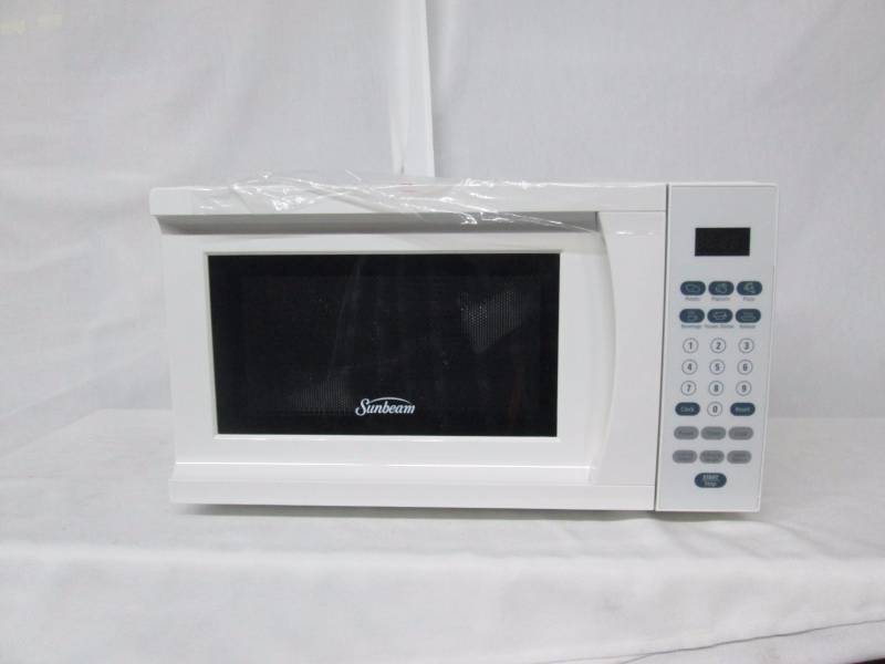 lot 37 image: Sunbeam 0.7 cu. ft. Countertop Microwave Oven