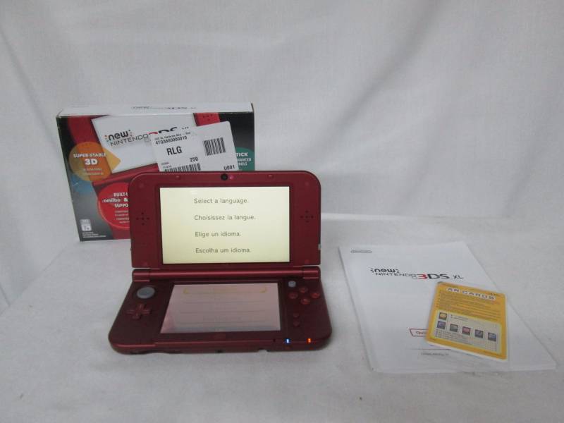 lot 27 image: Nintendo 3DS XL Hardware - Red