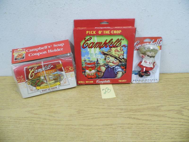 lot 23 image: Campbells Soup - Trivet, Coupon Holder, Magnet