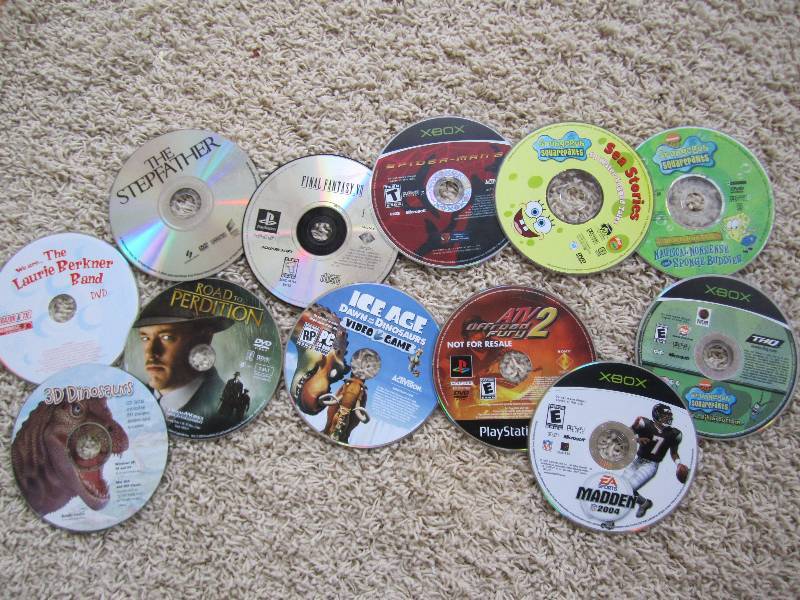Lot of DVDs and X Box games, sold a...