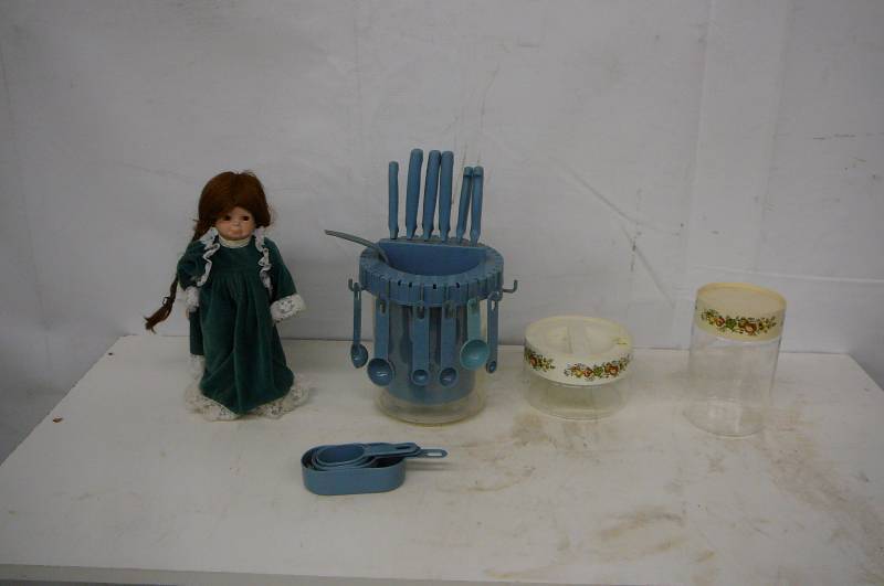 lot 24 image: Kitchen Stuff Knives measuring cups glass container Doll