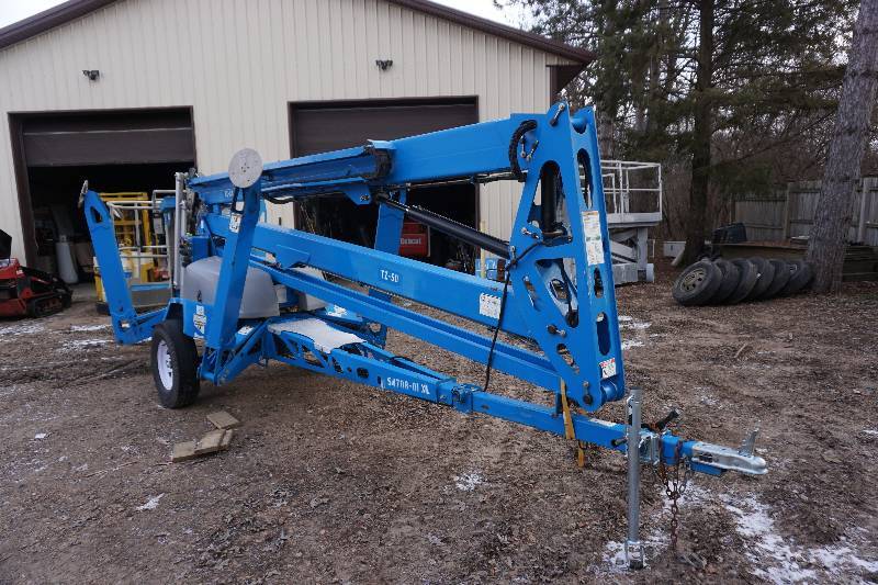 lot 2 image: 2012 Genie Model TZ50 Tow Behind Commercial Man Lift