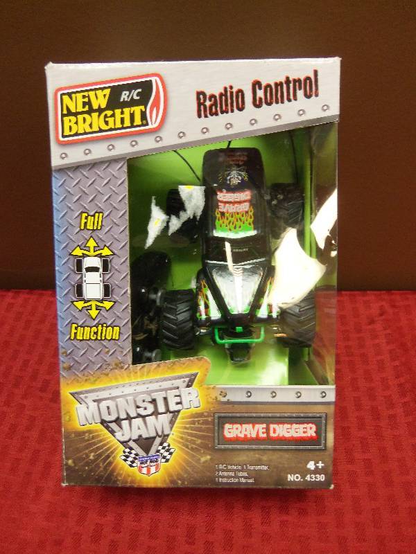 lot 84 image: New Bright RC Monster Jam Grave Digger