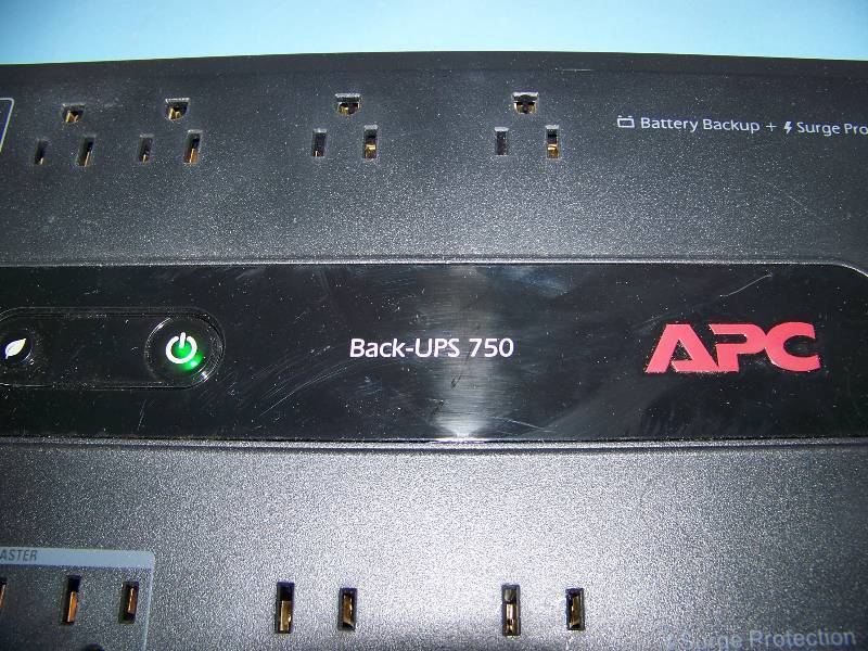 lot 33 image: APC, 10 Outlet, UPS (Uninterruptible Power Supply)  Battery Back-Up and Surge Protection Unit