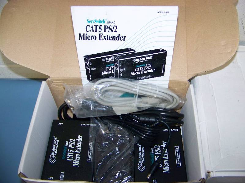 lot 94 image: (4) Black Box, Cat5  PS2 Micro Keyboard and Mouse Extenders in original boxes