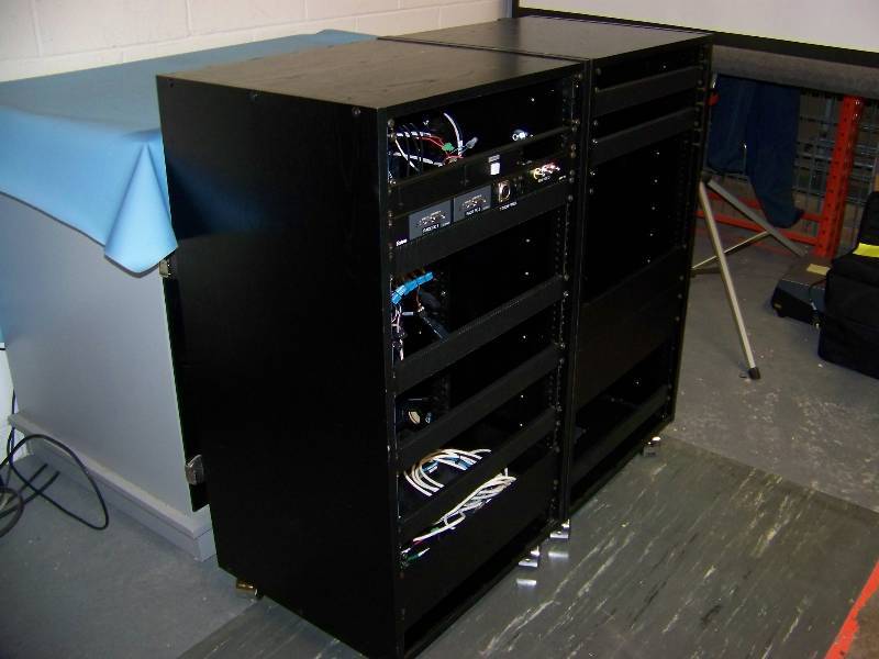 lot 98 image: (2) Mid-Sized, Wood Enclosed, Computer  Server  Audio and Video Equipment Racks on Wheels