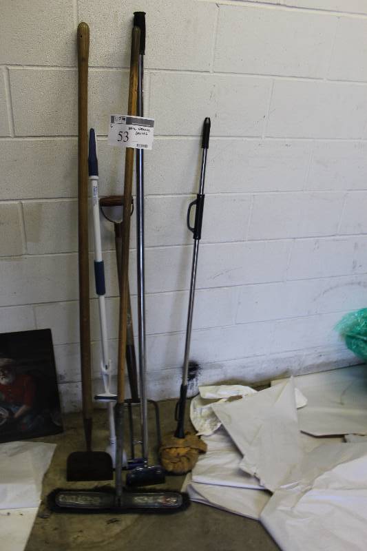 Assorted garden and garage tools (6) including hoes (2) large broom (1) and more